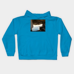 Seaside Serenity: Corfu Boat View Through Rock Window Kids Hoodie